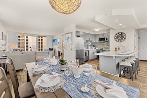 Comfortable seating and a seamless flow into the kitchen and dining area make this a perfect shared space.