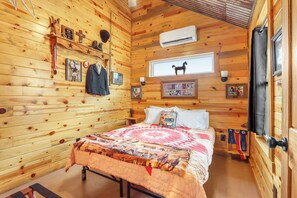 Bedroom one has a queen size bed