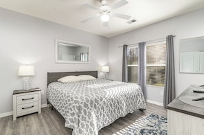 Relax and recharge in this well-appointed primary bedroom with king bed.