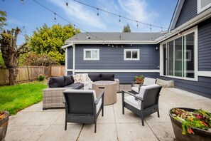 Backyard Bliss — Unwind by the firepit or fire up the grill for a fun outdoor gathering.