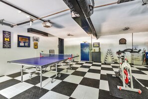 Game on! Ping pong, darts, and a mini gym right at home.