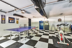 Game on! Ping pong, darts, and a mini gym right at home.