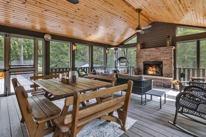 The ultimate screened-in hangout, rain or shine.