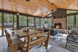 The ultimate screened-in hangout, rain or shine.
