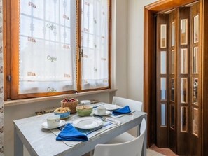 Furniture, Table, Outdoor Table, Outdoor Furniture, Chair, Garden, Shade, Flowerpot, Landscaping, Kitchen & Dining Room Table