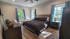 Master bedroom with king bed, views from the side and back and bathroom attached