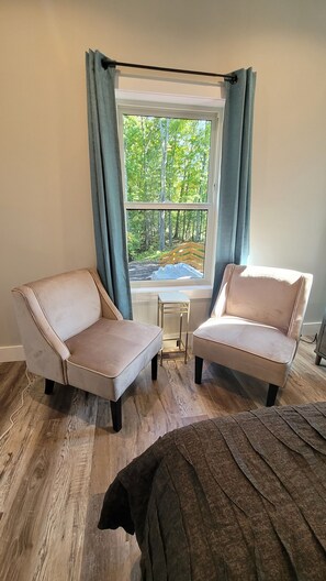 Sitting area in the master bedroom great for morning coffee or to read a book