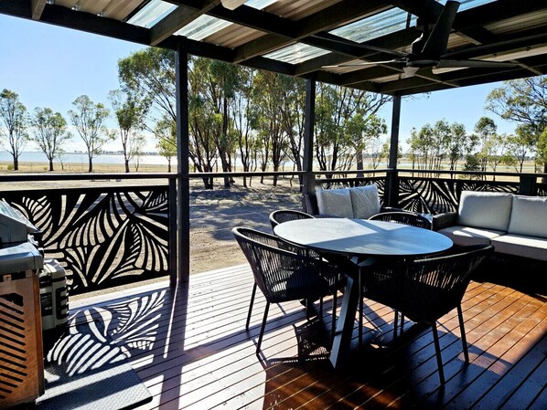 Wow factor large deck with comfortable outdoor furniture and views of Lake Waranga within walking distance.