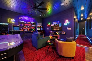80s theme game room with Nerf gun wall