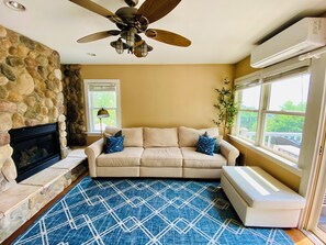 Upper level living room with walkout balcony