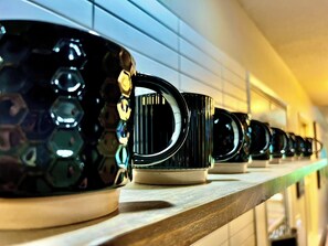 Enough mugs for everyone to enjoy a coffee or tea first thing in the morning.
