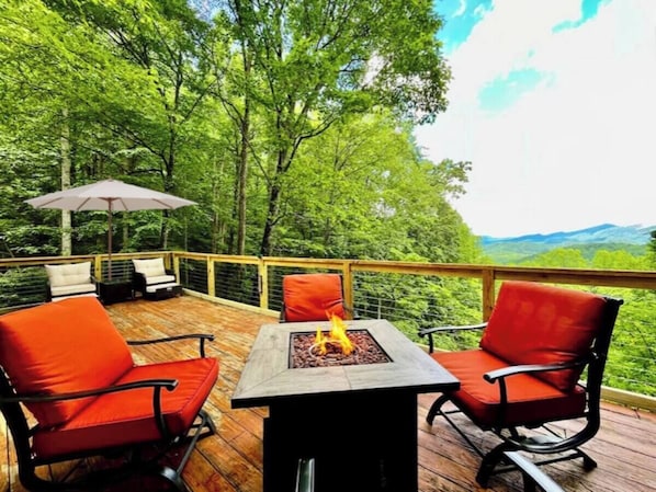 Enjoy the fire and breathtaking view from the front observation deck.