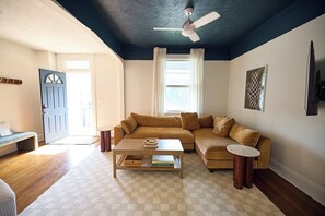Natural light filled room, high ceilings