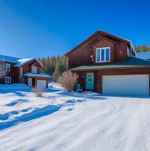 Snow-covered charm welcomes you to your mountain retreat.