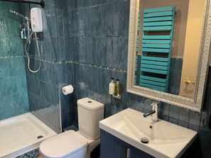 bathroom with electric shower
