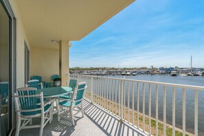 Enjoy dining with the dolphins on your private 27’ x 8’ deck