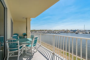 Enjoy dining with the dolphins on your private 27’ x 8’ deck