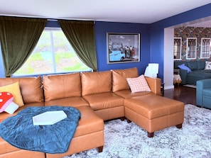 Spread out and relax. Choose one of five sofas throughout the space to read a book, watch a movie, or watch the ships go by.