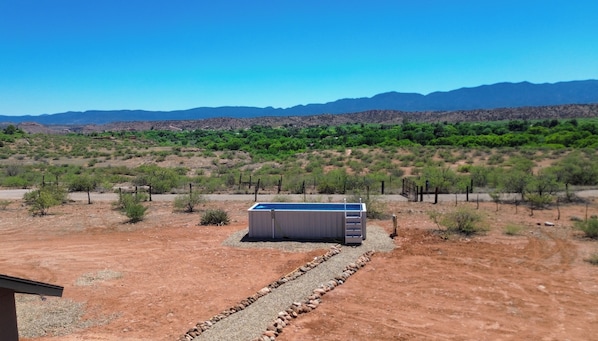 Shipping container pool with mountain views