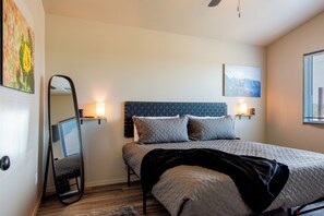 Bedroom with king size Tuft & Needle mattress and pillows
