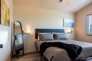 Bedroom with king size Tuft & Needle mattress and pillows