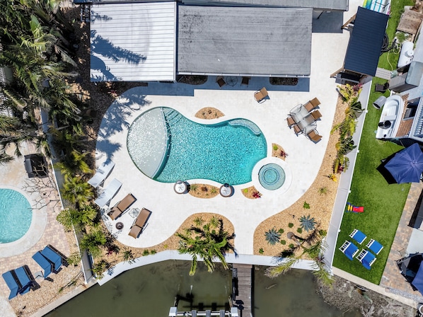 Waterfront oasis with pool, spa, boat and dock available!