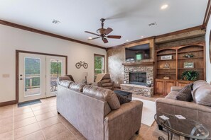 Family room, 2 couches, 2 recliners, Roku smart TV