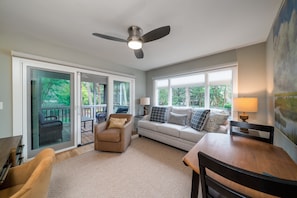 Cozy den on the 1st floor with desk and game table.