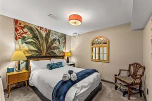 A plush queen bed, ideal for restful nights in Boulder!