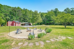 Fire Pit | Cabin Exterior | Mountain-View Property