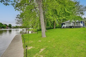 House Exterior | Private Backyard | Lake Access