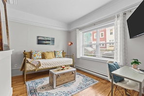 Cozy vibes and colorful accents! Our living area is your perfect spot to recharge.