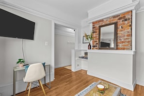 Your ideal spot for both productivity and leisure. Work comfortably at the desk, then kick back and relax in this inviting space.