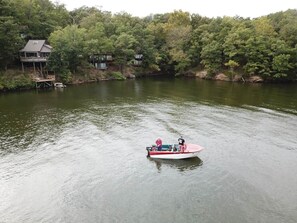 This serene lakefront property offers breathtaking water views and direct access to the tranquil lake, perfect for those seeking a peaceful escape. Enjoy the expansive outdoor space, ideal for relaxation and entertaining, with the calming presence of nature right at your doorstep.