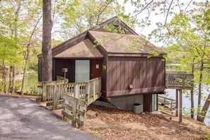 "Welcome to your unique treehouse retreat! Treetop Village 79 offers an unforgettable stay, perfectly nestled among the trees with hints of the lake."