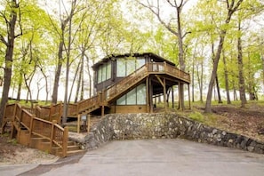 Experience the magic of Treetop Village. This is your charming villa, The Treetop Nest, inviting you to a serene escape above it all.