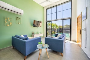 Living room looking at pool view