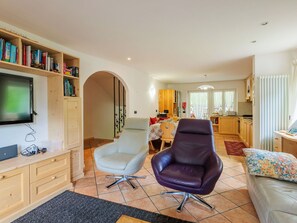 Furniture, Interior Design, Flooring, Floor, Couch, Wood, Ceiling, Living Room, Room, Lighting