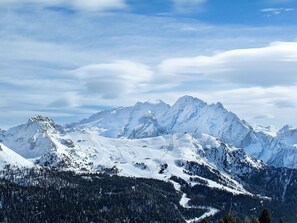 Mountain, Sky, Snow, Blue, Mountainous Landforms, Winter, Mountain Range, Terrain, Glacial Landform, Ridge
