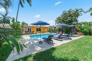 The backyard pool oasis is ideal for unforgettable days in the sun