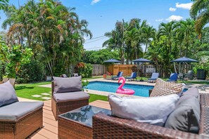 Lounge the day away by the sparkling pool on the sunny deck