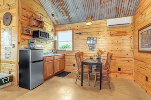 Closer view of the kitchenette and dining space.