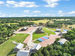 Aerial view of the RusTx Ranch property.  Cabin 3 sits in the cluster of three cabins at the right of the picture.