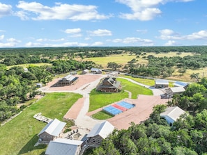 Aerial view of the RusTx Ranch property. Cabin 3 sits in the cluster of three cabins at the right of the picture.