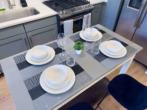 With cozy seating and an open layout, this dining room ensures everyone feels comfortable while enjoying a great meal together.