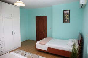 Twin size bed in the first bedroom