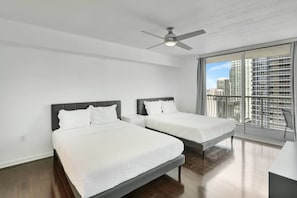 Rest easy in plush queen beds with premium linens and a peaceful atmosphere.