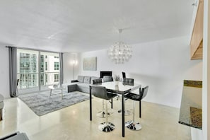 Inviting dining space perfect for meals, work, or a quiet cup of coffee.