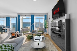 Large Cozy Living Room with 65" Smart TV