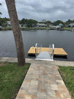 New pavers lead you from the house to the floating dock.